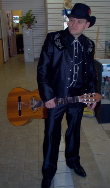 We have Racks of Country Music Costumes like this Johnny Cash Country Singer Outfit. We also have Country Music Costumes, Country Music CMA Costumes, Country Music Stars Costumes, Country Music Entertainers Costumes, Country Music Theatrical Costumes, Country Music Artist Costumes, Country Music Ring of Fire Costumes, Country Music Johnny Cash Costume, Country Music Legends, Country Music Male Artists, Classic Country Music Celebrities Costumes, Country Music Fancy Western Wear Costumes and Accessories in stock.