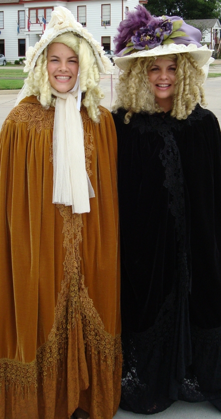 Dickens on The Strand Ladies in Victorian Cloaks, Hats and Bonnets
